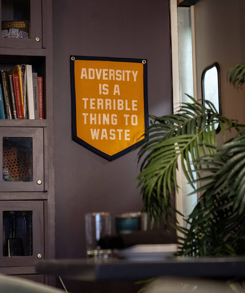 Oxford Pennant - Adversity Is A Terrible Thing To Waste Camp Flag • Unreasonable Hospitality x Oxford Pennant